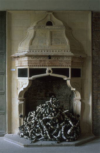grand italian fireplace with embroiled place in it's hearth